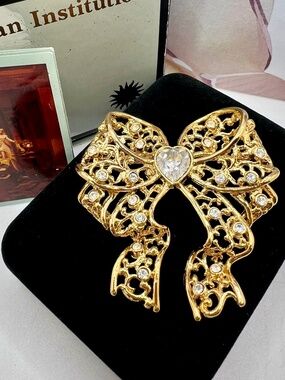 Smithsonian Institution for Avon Openwork Bow Pin Brooch